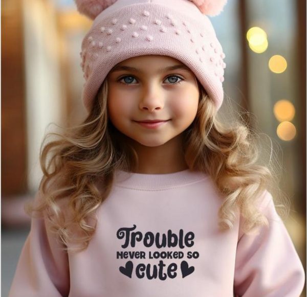 Trouble never looked so cute children’s slogan sweatshirt