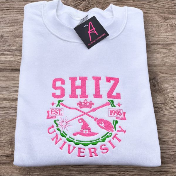 Wicked, Shiz university embroidered sweatshirt.