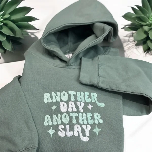 Another day another slay Children's embroidered slogan sweatshirt.