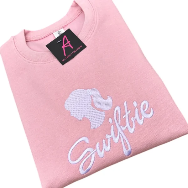 Children's embroidered Swiftie sweatshirt.