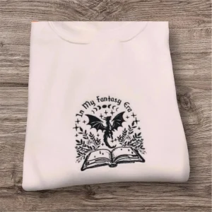 Embroidered Fantasy Era Sweatshirt: Book Dragon Crew Neck
