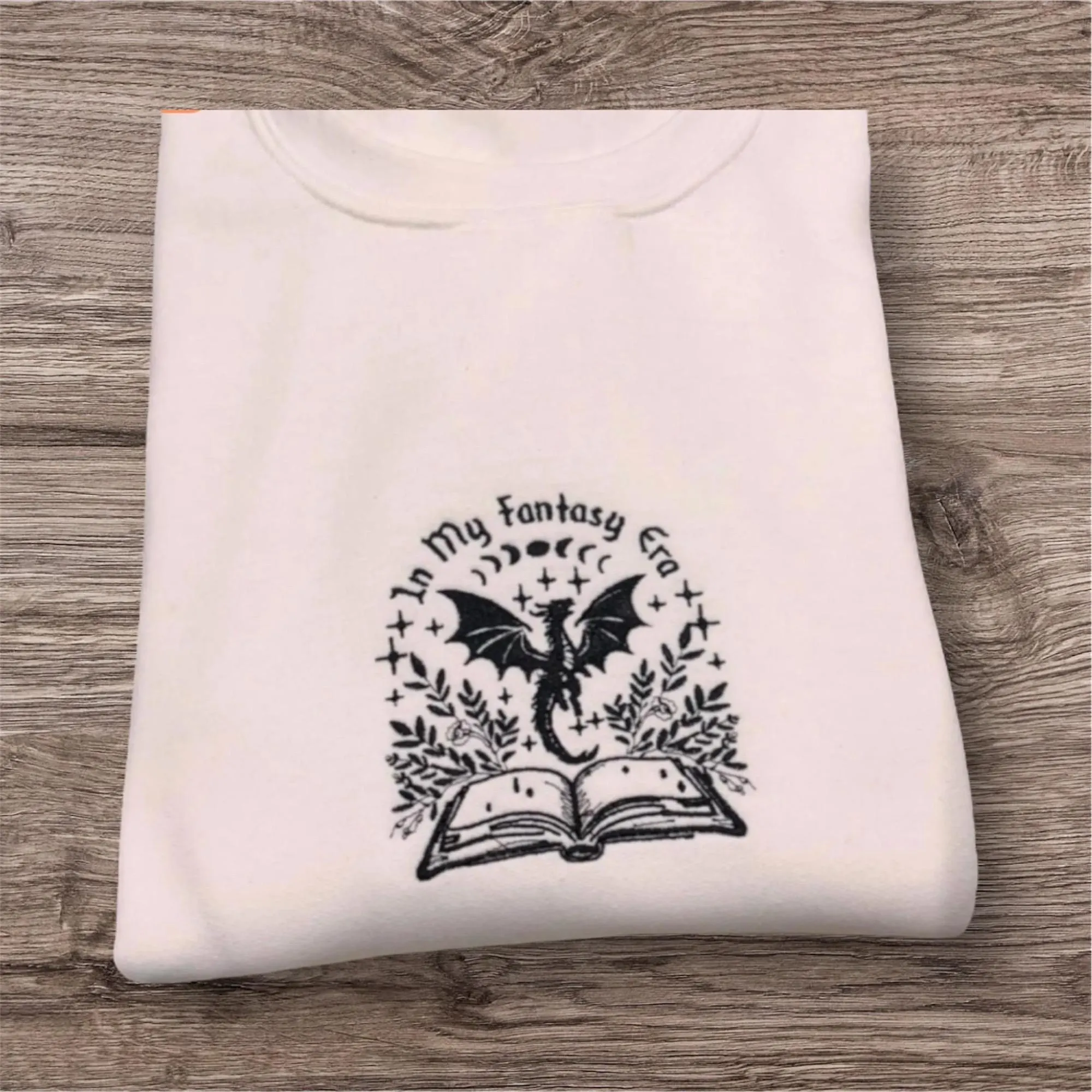 Embroidered Fantasy Era Sweatshirt: Book Dragon Crew Neck