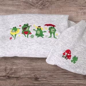 Embroidered frogs dancing in the rain, sweatshirt or hoodie. Optional toadstool and frog sleeve embroidery, cute animal clothes gift.