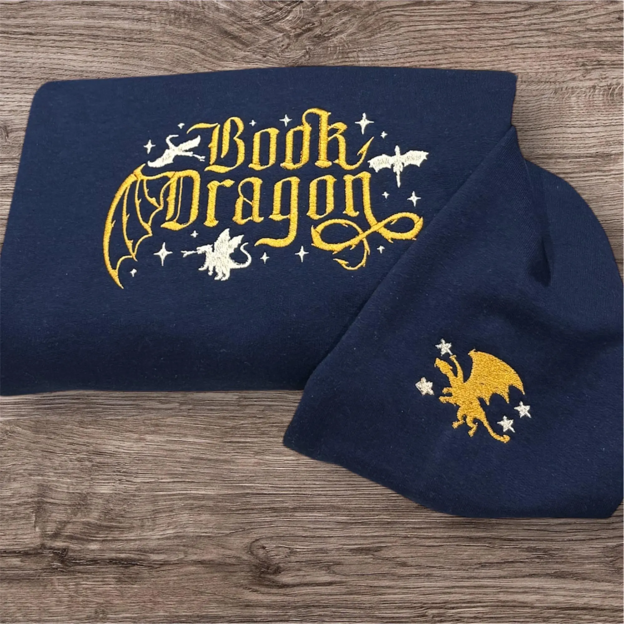 Embroidered book dragon sweatshirt, book hoodie.