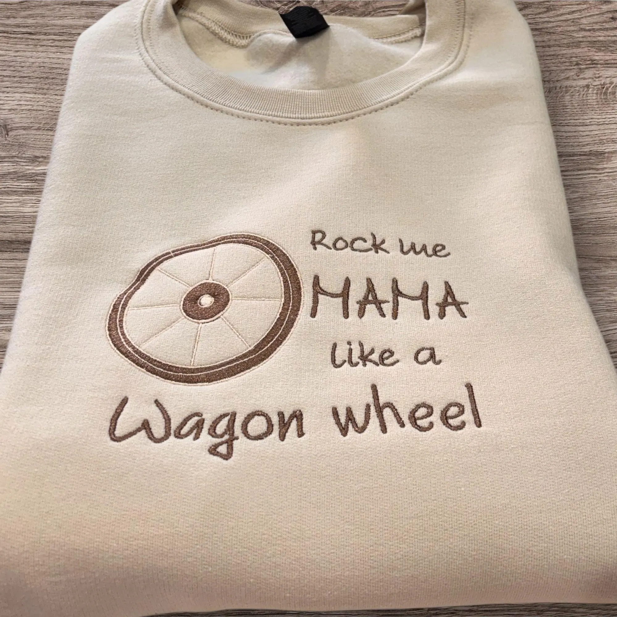 Embroidered Rock me mama like a wagon wheel sweatshirt or hoodie.
