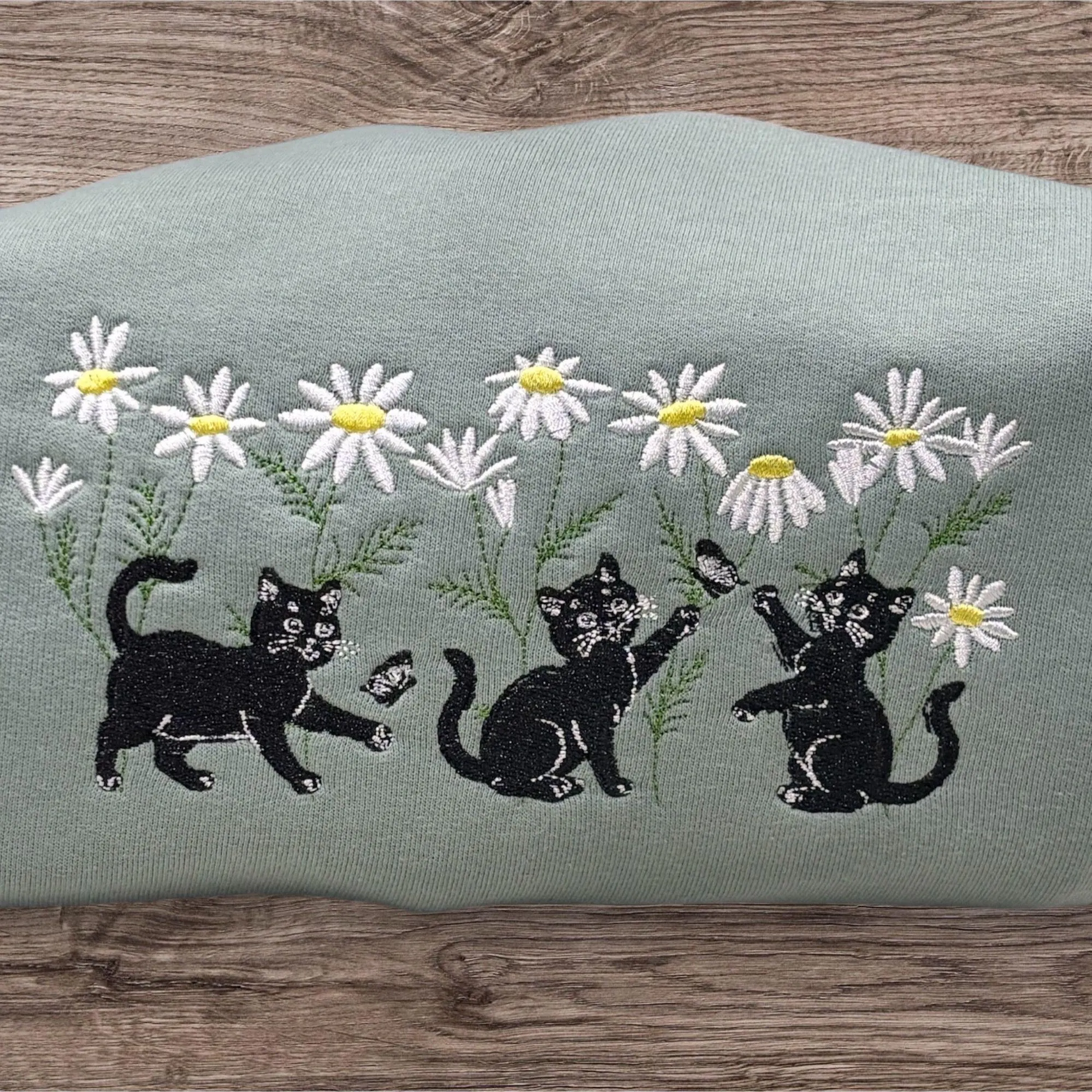 Cats Chasing Butterfly’s In A Hedgerow Of Daisy Flowers Embroidered Sweatshirt Or Hoodie. - Image 2