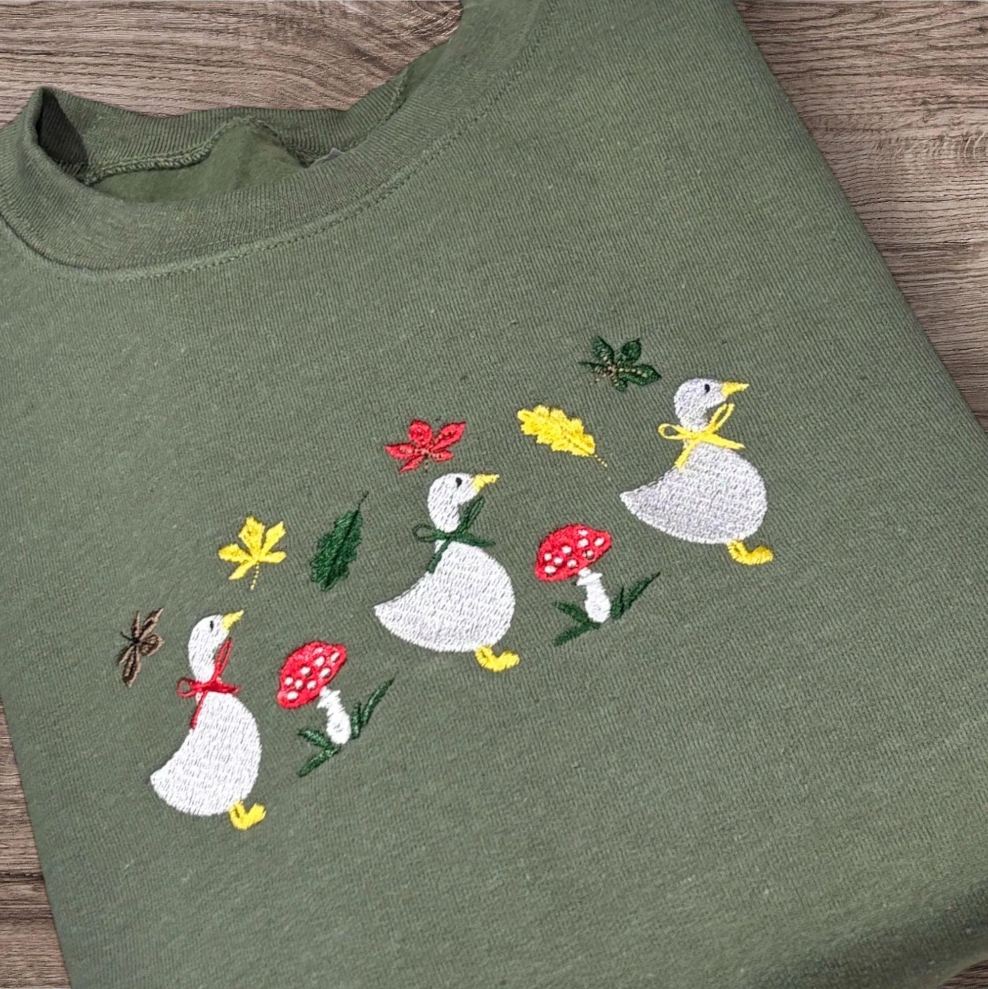 Embroidered row of geese, autumn leaves, mushroom sweatshirt or hoodie. - Image 2