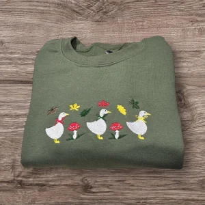 Embroidered row of geese, autumn leaves, mushroom sweatshirt or hoodie.