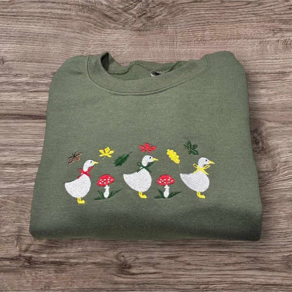 Embroidered row of geese, autumn leaves, mushroom sweatshirt or hoodie.