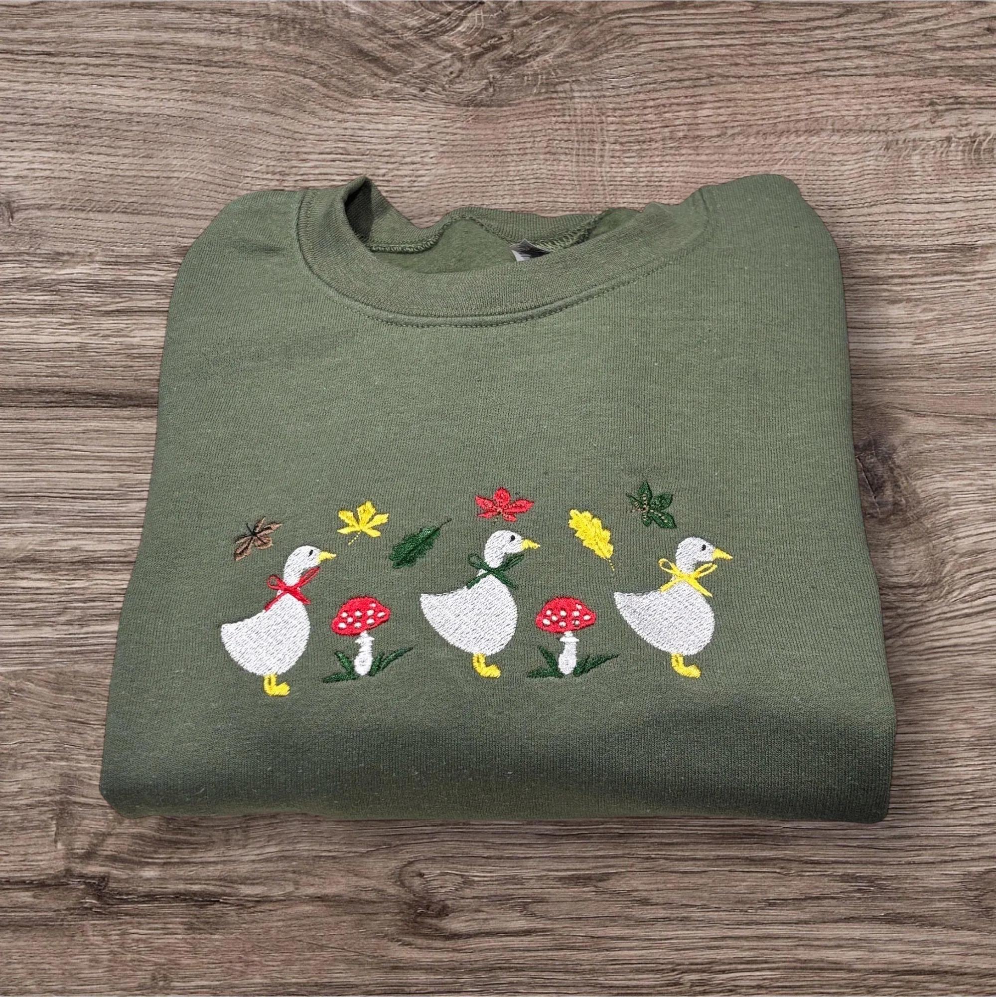 Embroidered row of geese, autumn leaves, mushroom sweatshirt or hoodie.