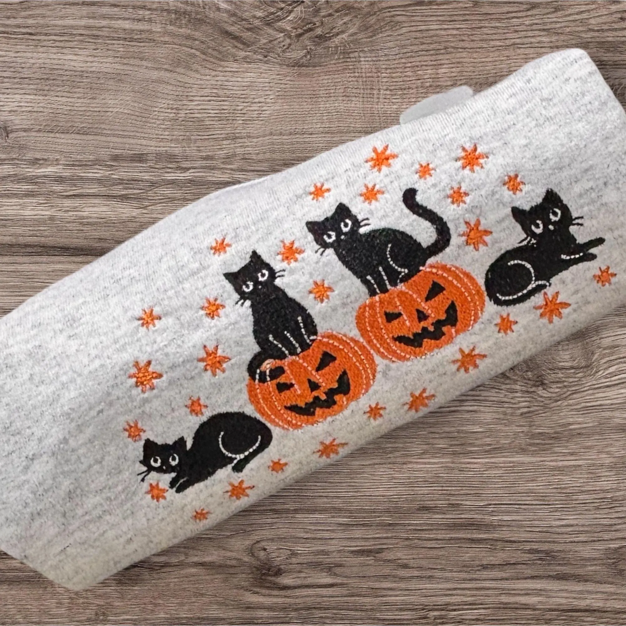 Halloween cats and pumpkins embroidered sweatshirt or hoodie.