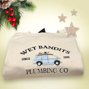 Embroidered Wet Bandit Pluming Co Christmas sweatshirt ~ Funny Festive Hoodie.