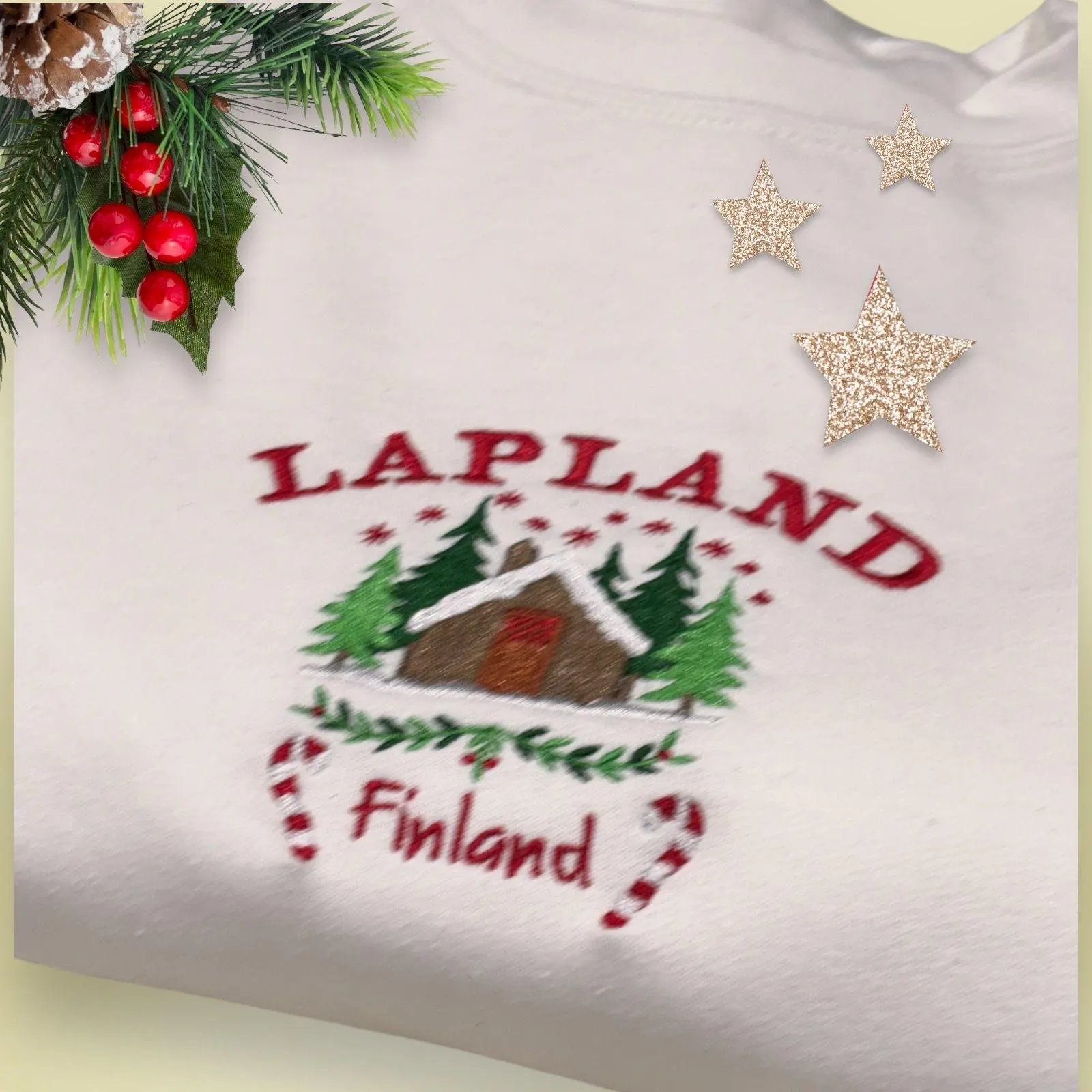 Embroidered Lapland Christmas Sweatshirt: Festive Log Cabin Design - Image 2