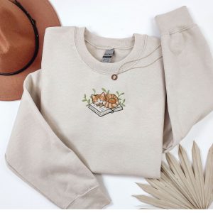 Embroidered sleepy book cat sweatshirt