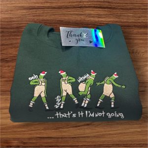 Embroidered Grinch inspired christmas sweatshirt