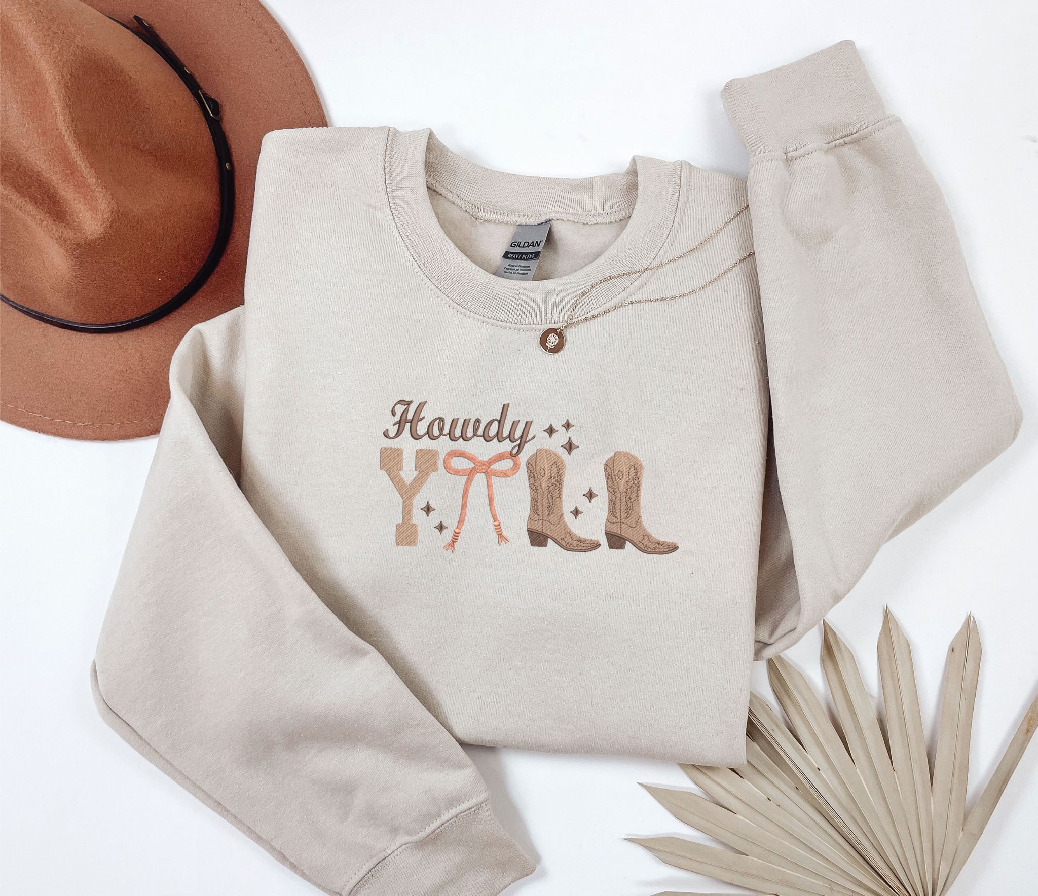 Embroidered Howdy y'all cowboy boots sweatshirt.