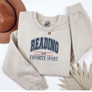Embroidered reading is my favourite sport sweatshirt.