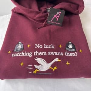 Embroidered Hot Fuzz No Luck Catching Them Swans sweatshirt